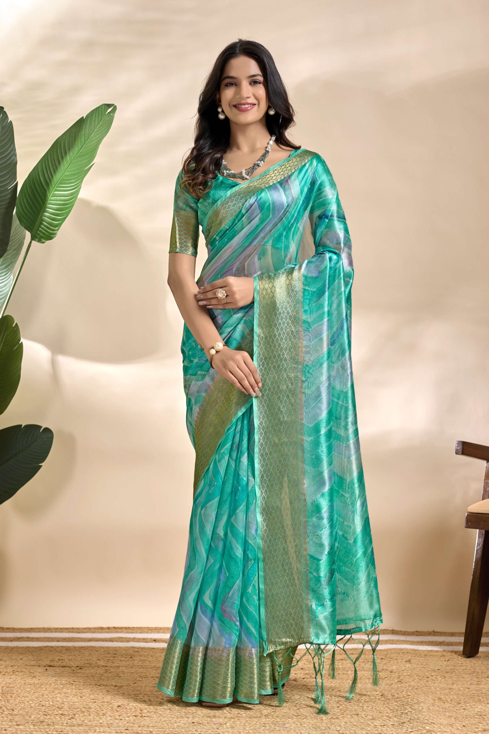 Gracefully crafted in a serene Saree