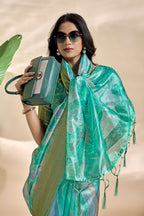 Gracefully crafted in a serene Saree