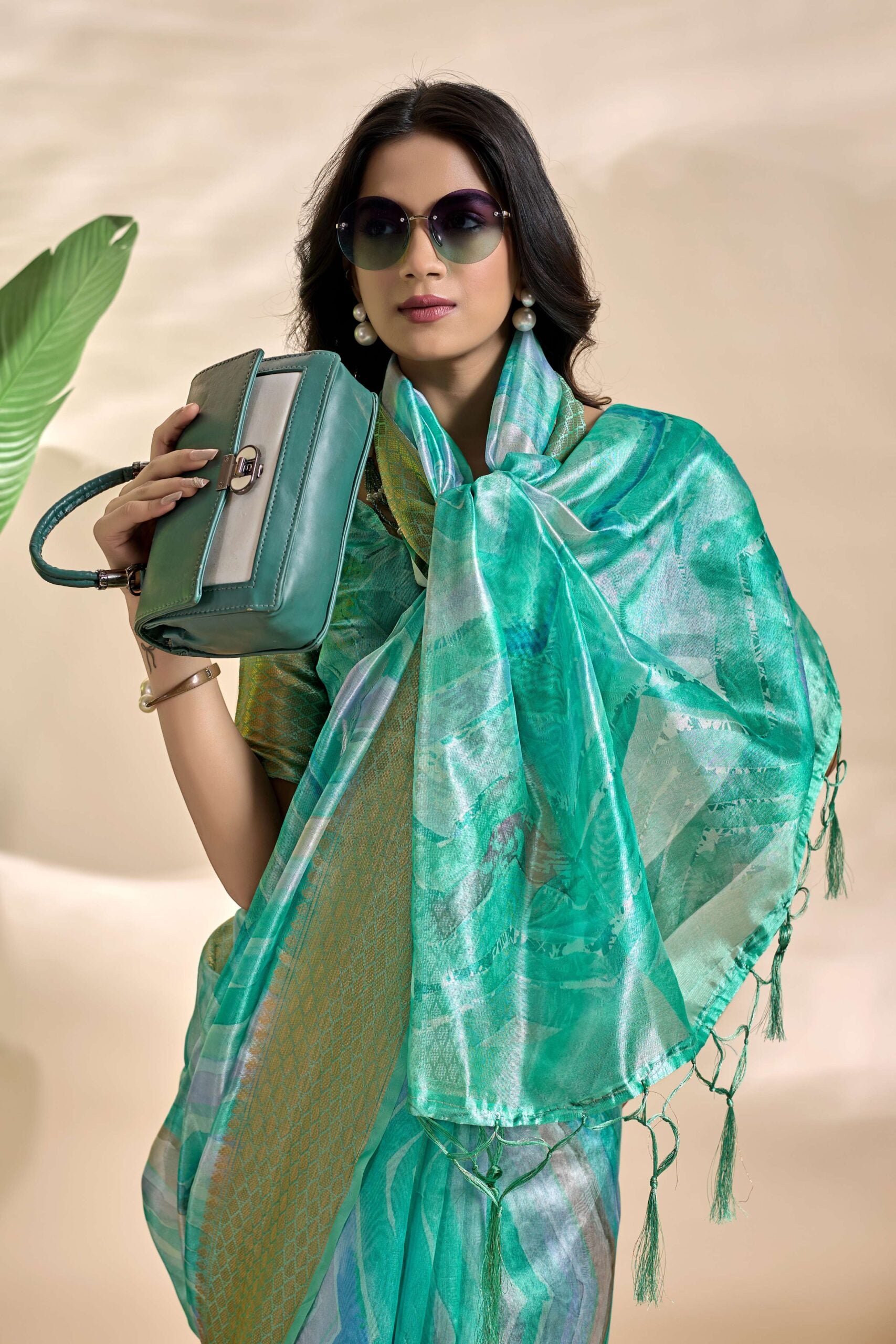 Gracefully crafted in a serene Saree
