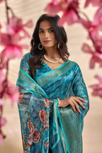 This elegant teal blue soft Saree