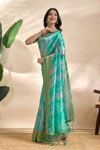 Gracefully crafted in a serene Saree
