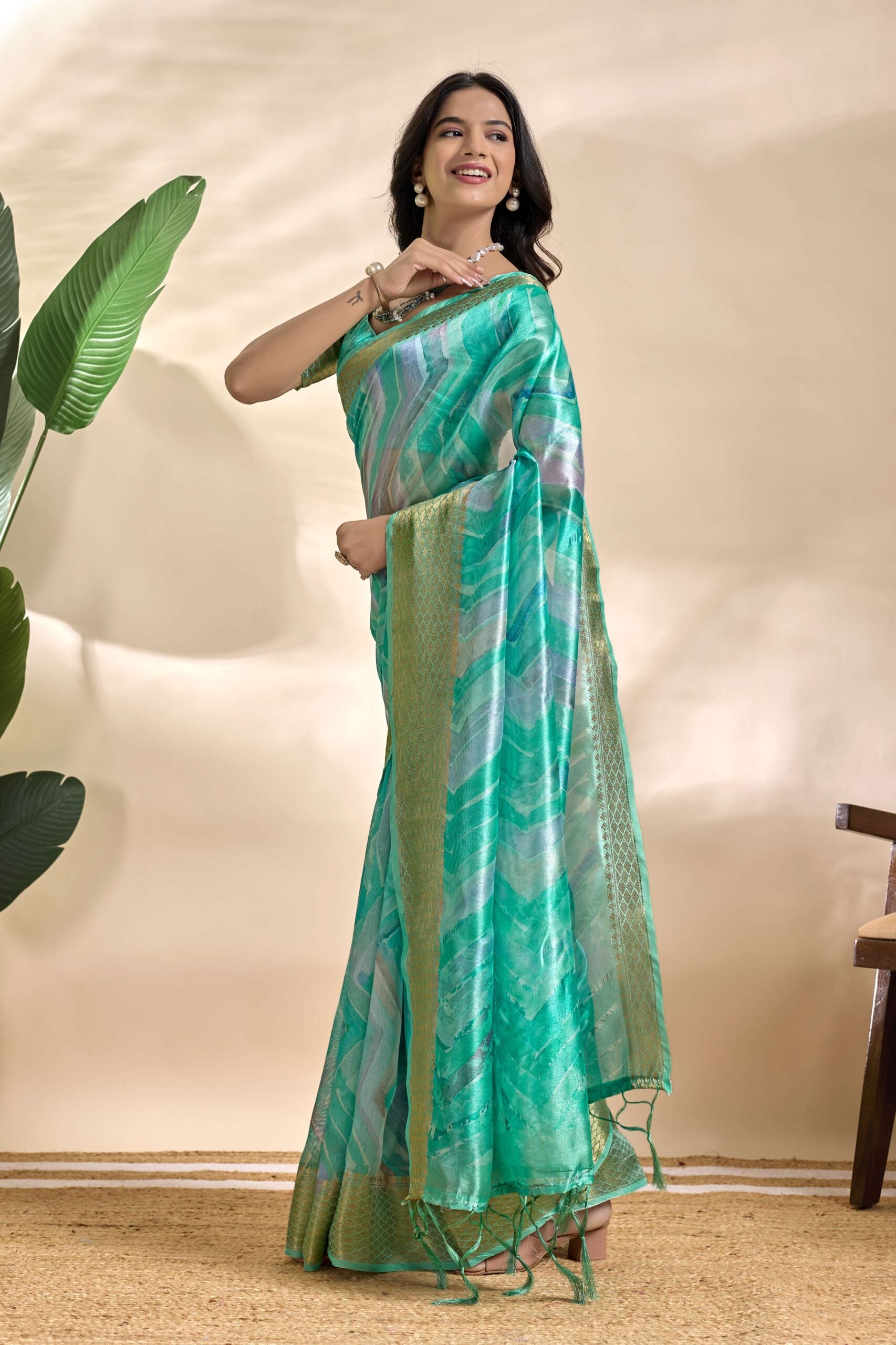 Gracefully crafted in a serene Saree