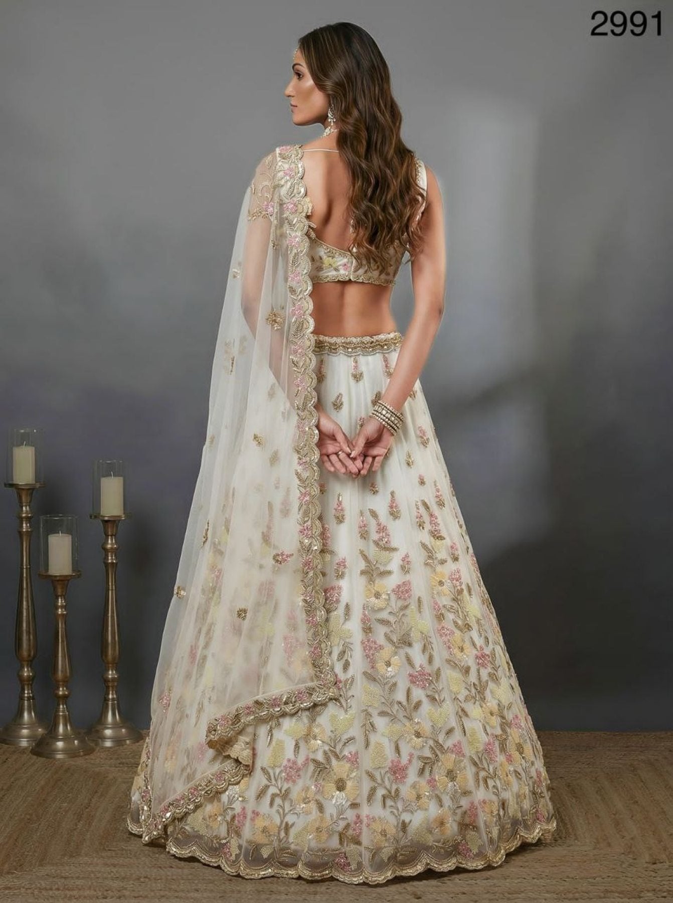 White Althera Net Lehenga with Multi Color Embroidery for Reception Wear blouse and dupatta detail