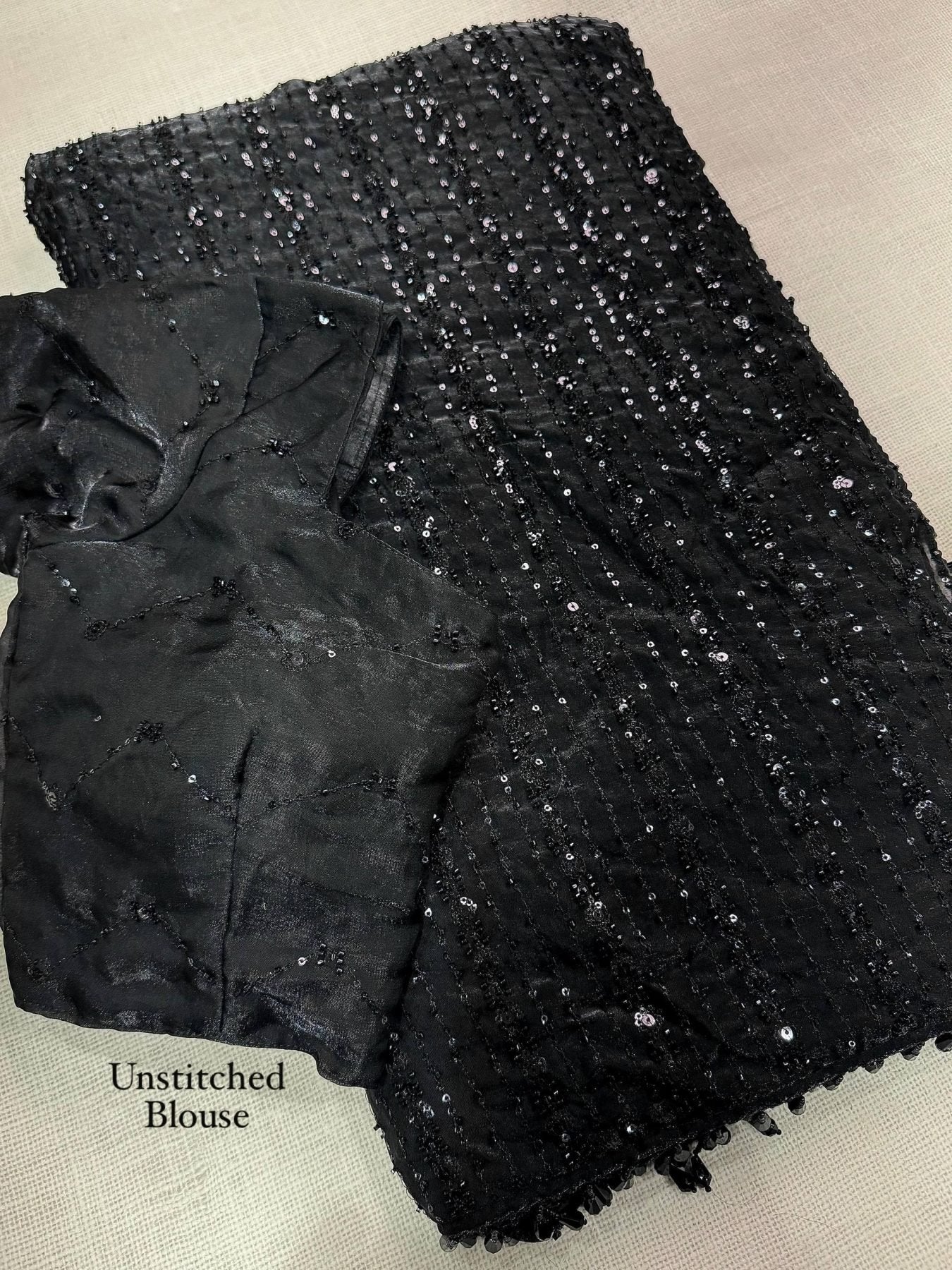 Black Satin Saree - fabric texture close-up