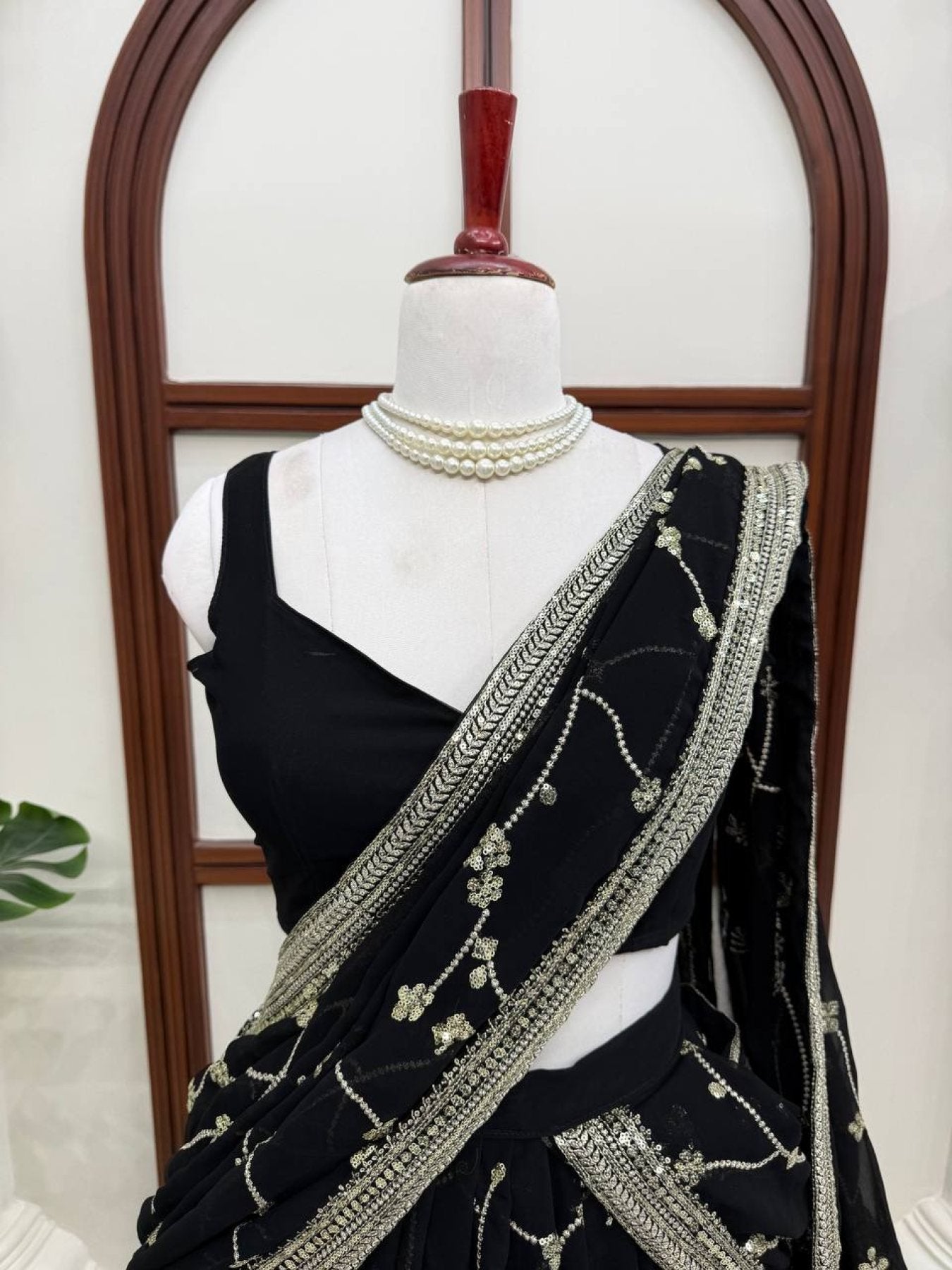 Black Breathtaking Faux Georgette Lehenga Saree Set with Heavy Sequins Embroidery front view