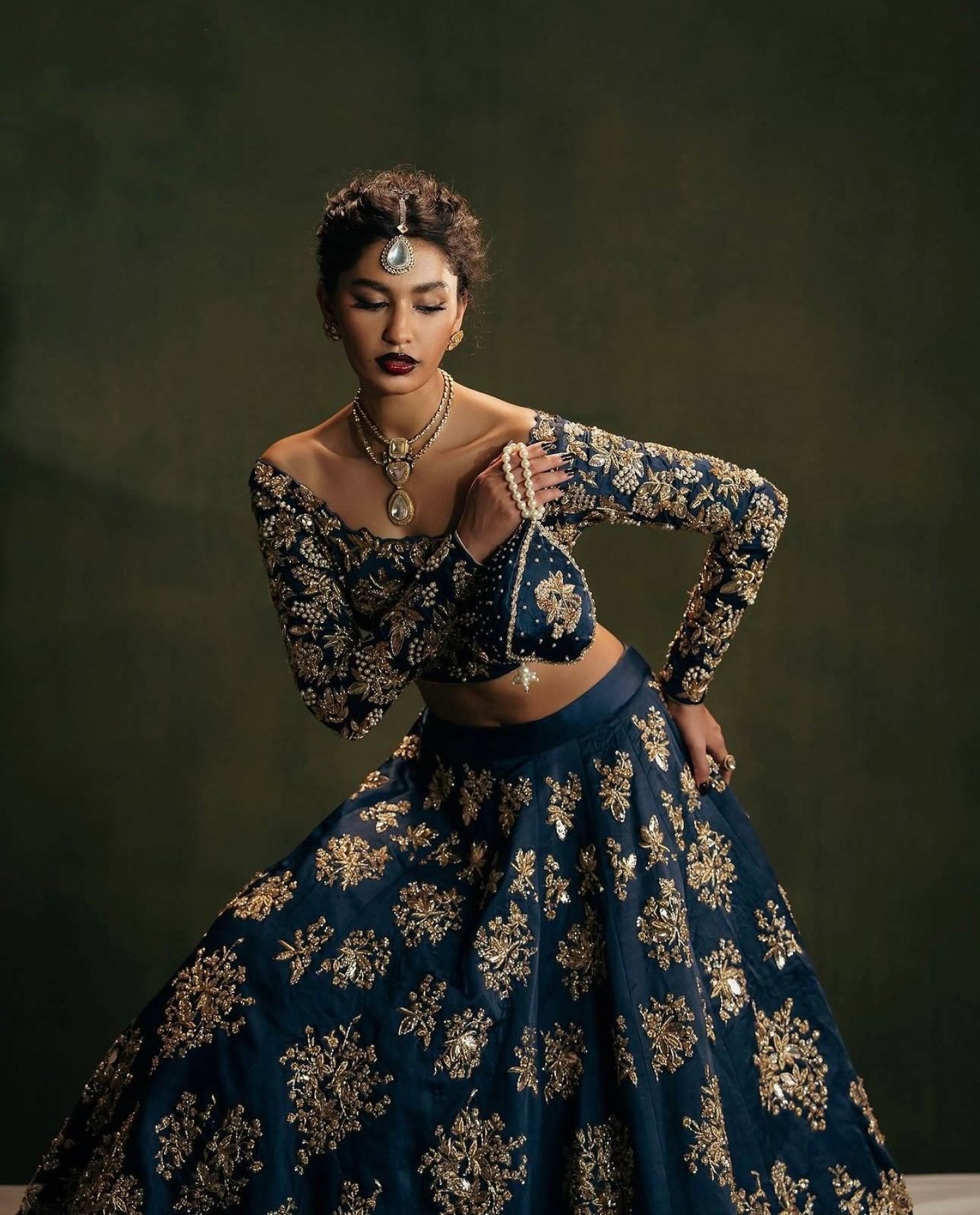 Calzora Polo Silk Lehenga with Zari Work and Tabby Dupatta for Grand Celebr back view