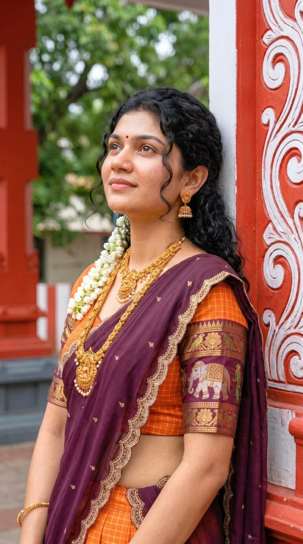 Orange Gadhwal Silk Lehenga Choli with Zari Weaving and Embroidered Dupatta fabric texture detail