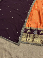 Orange Gadhwal Silk Lehenga Choli with Zari Weaving and Embroidered Dupatta styling view