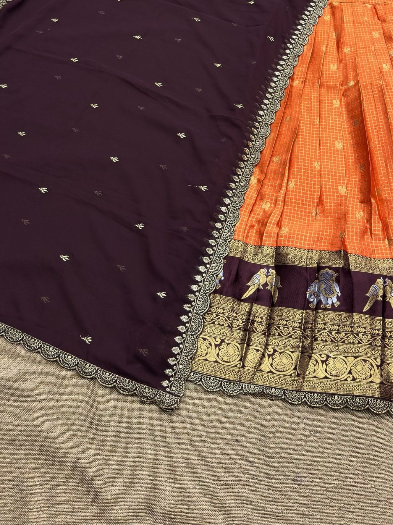 Orange Gadhwal Silk Lehenga Choli with Zari Weaving and Embroidered Dupatta styling view
