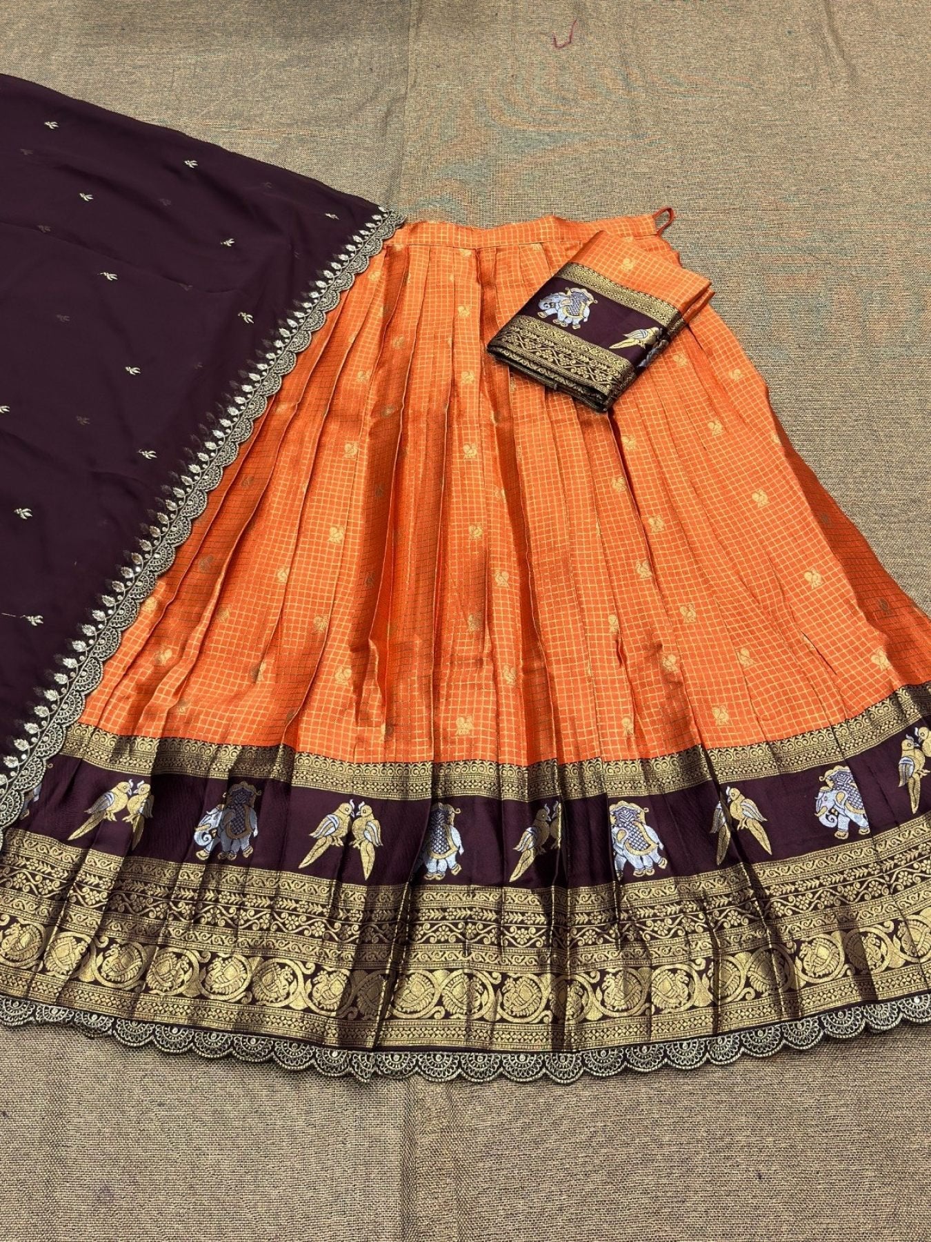 Orange Gadhwal Silk Lehenga Choli with Zari Weaving and Embroidered Dupatta front view