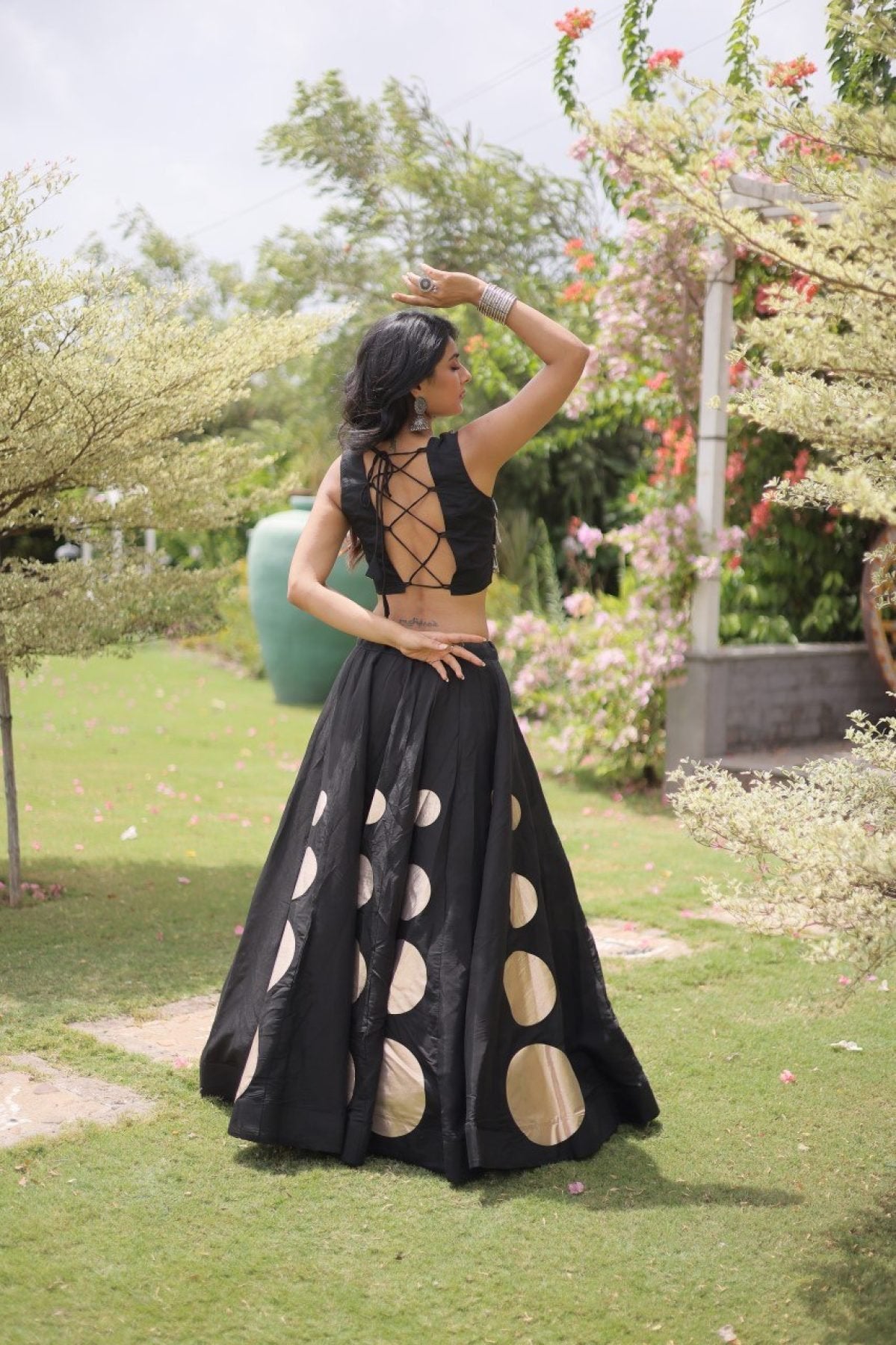 Roman Silk Navratri Lehenga Choli with Mirror Lace Work and 6 Meter Flair fabric texture detail