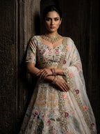 White Organza Lehenga with Heavy Cut Work embroidery close-up