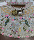 White Organza Lehenga with Heavy Cut Work front view