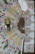 White Organza Lehenga with Heavy Cut Work blouse and dupatta detail