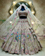 White Organza Lehenga with Heavy Cut Work blouse and dupatta detail