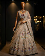 Cream Butterfly Net Lehenga Choli with Heavy Embroidery Work and Net Dupatta fabric texture detail
