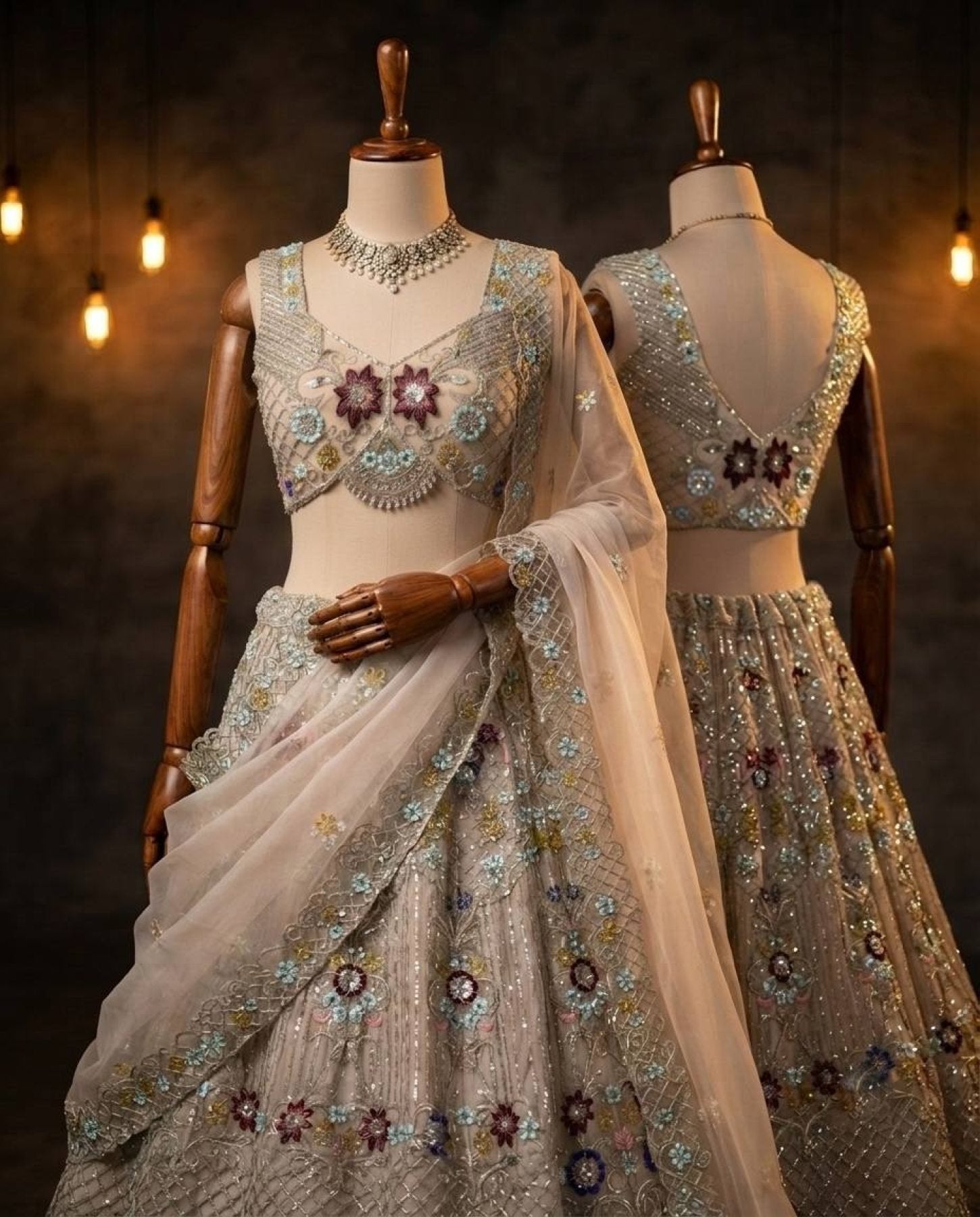 Cream Butterfly Net Lehenga Choli with Heavy Embroidery Work and Net Dupatta back view
