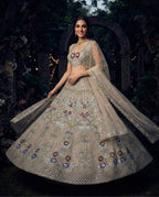 Cream Butterfly Net Lehenga Choli with Heavy Embroidery Work and Net Dupatta front view