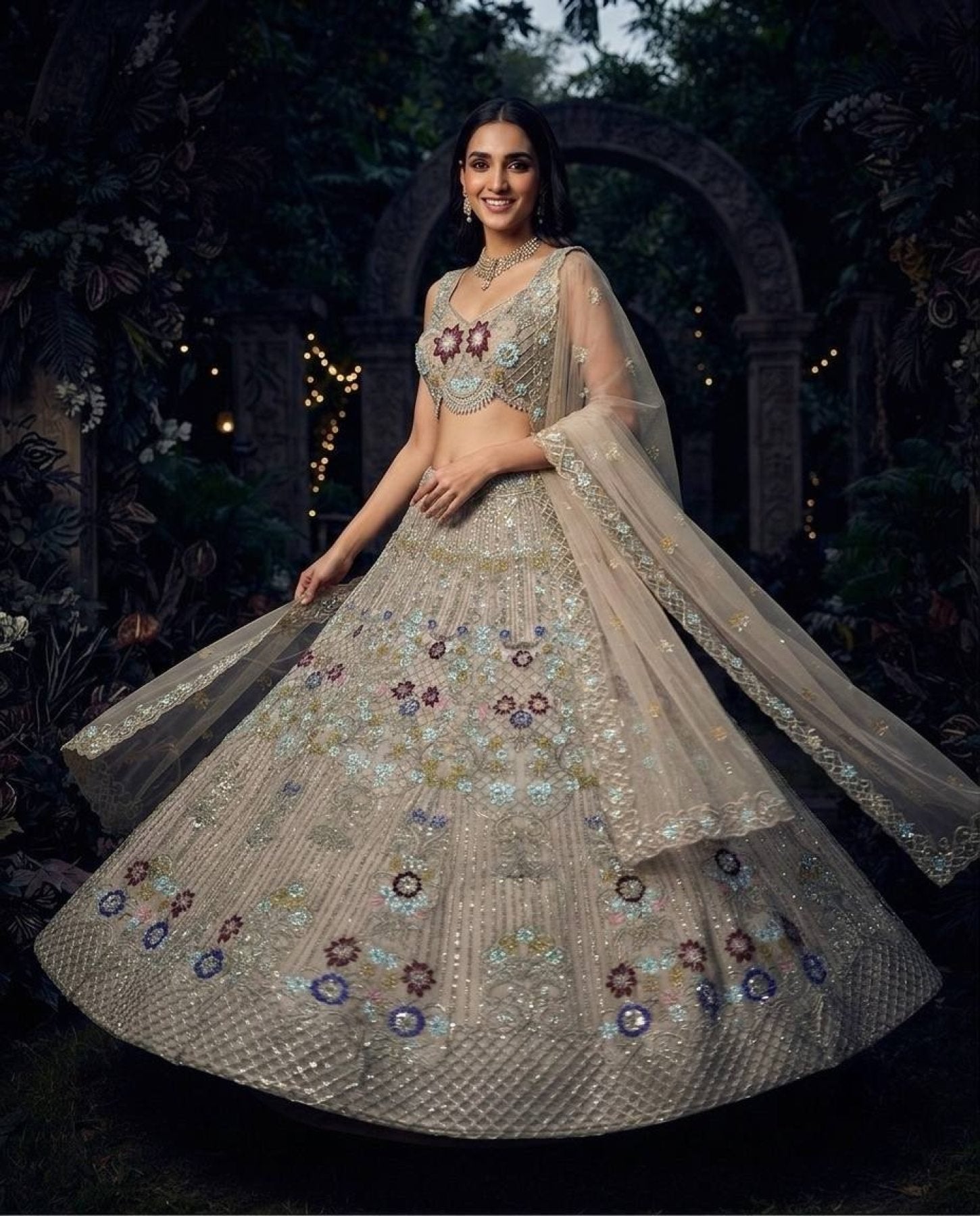 Cream Butterfly Net Lehenga Choli with Heavy Embroidery Work and Net Dupatta front view