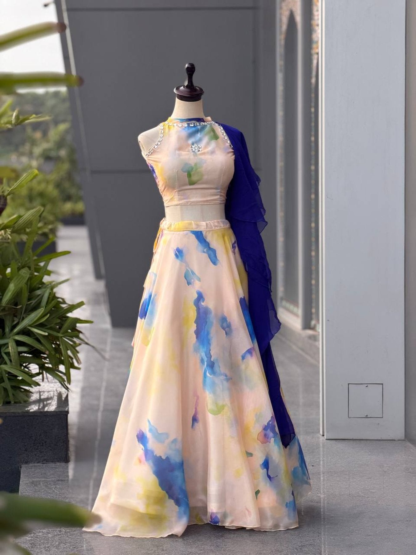 Cream Jimmy Organza Lehenga Choli with Digital Print and Stone Work Blouse front view