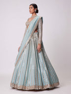 Blue Rangoli Silk Lehenga Choli with Foil Mirror and Coding Embroidery Work fabric texture detail