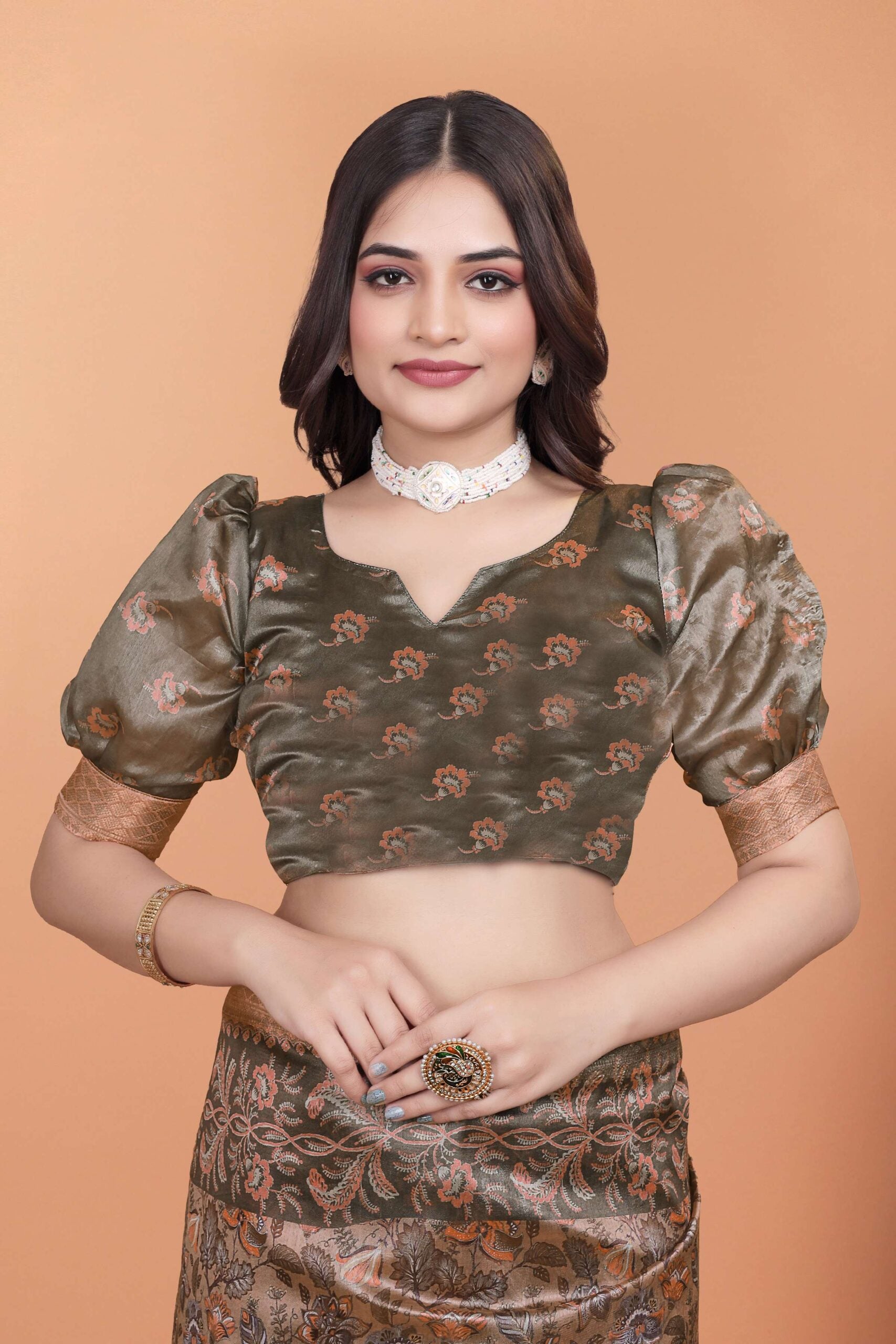 Radiate elegance in this exquisite Saree