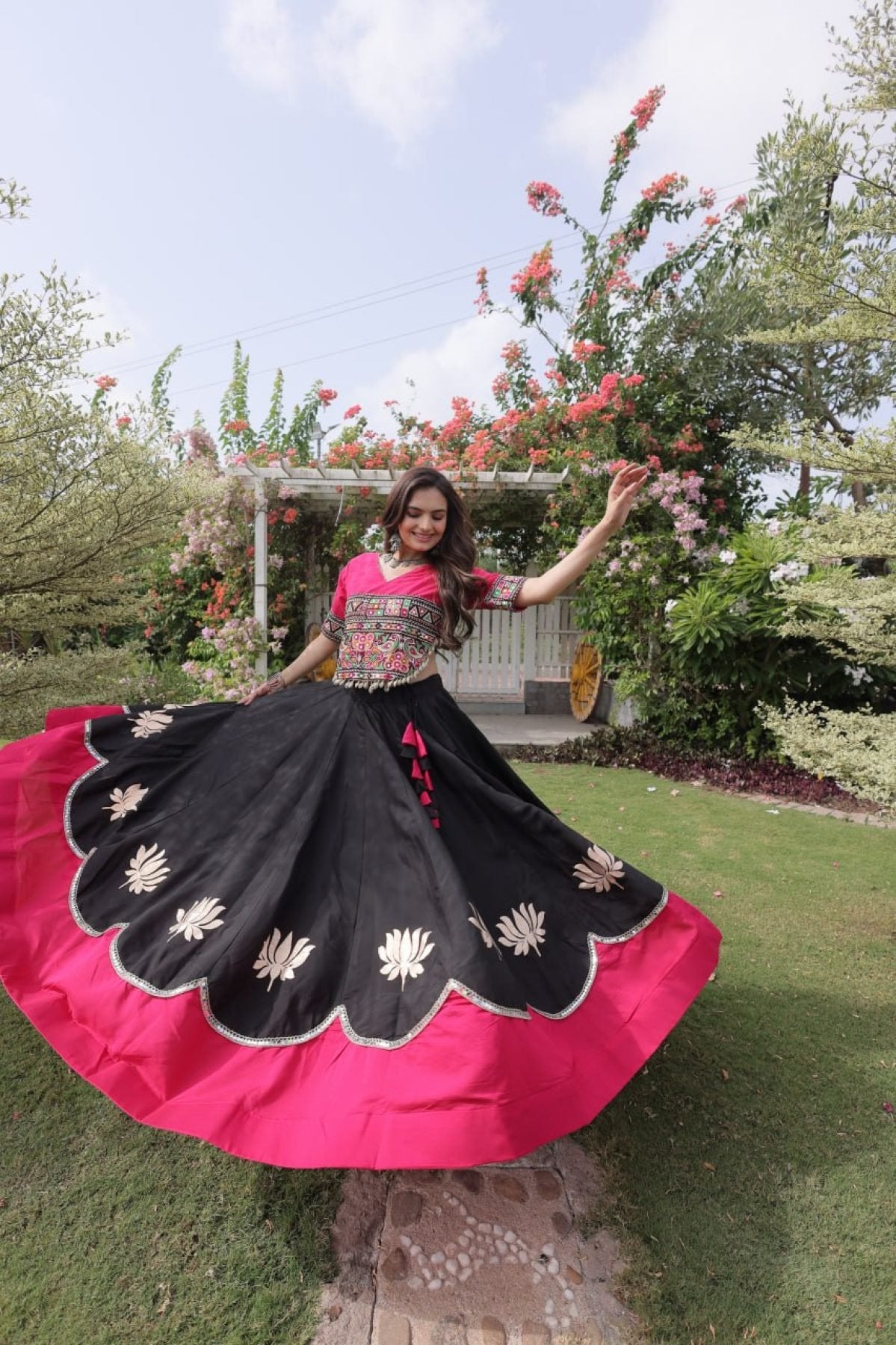 Black Yellow Roman Fabric Navratri Lehenga Choli with Kutchi Gamthi Embroidery Work full drape view