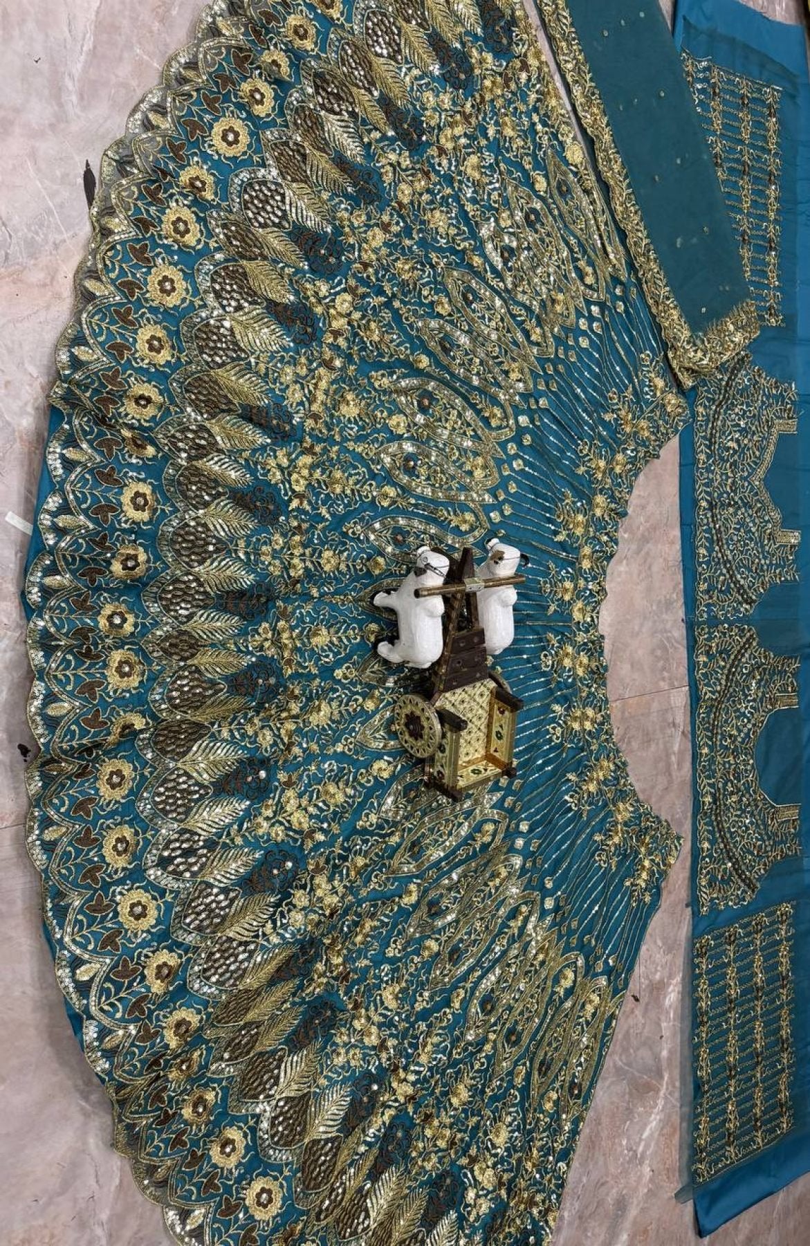 Teal Butterfly Net Lehenga with Embroidery Sequins Work blouse and dupatta detail