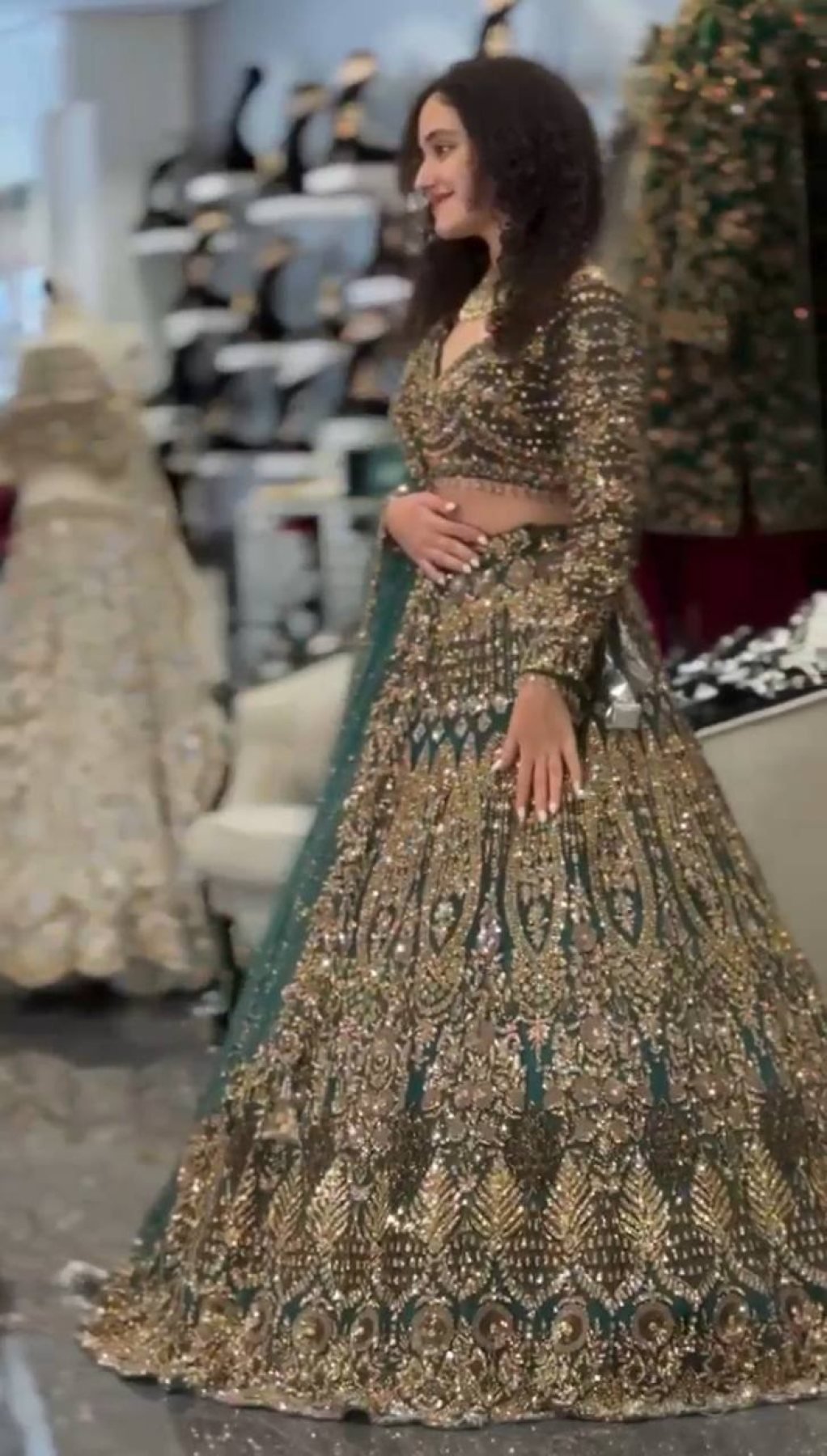 Teal Butterfly Net Lehenga with Embroidery Sequins Work blouse and dupatta detail
