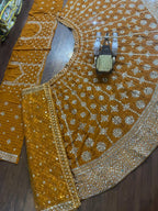 Yellow Faux Georgette Lehenga with Embroidered Dupatta for Bridal Fashion blouse and dupatta detail