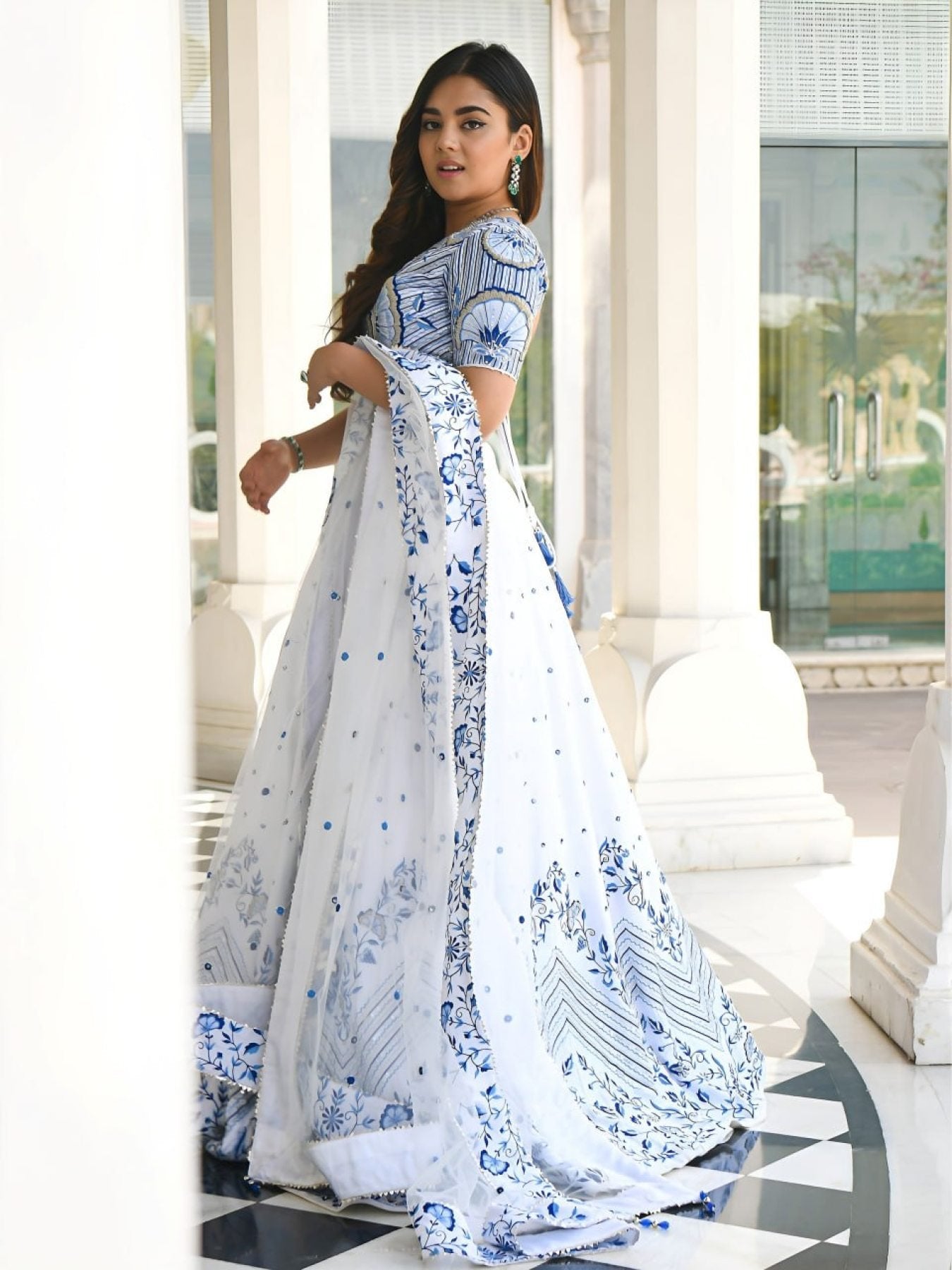 Blue Satin Lehenga with Embroidered Net Dupatta back view