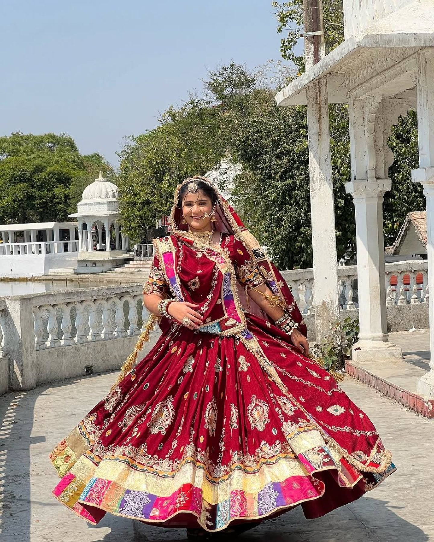 Red Digital Print Lehenga with Mirror Work and Gota Patti Detailing embroidery close-up