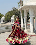 Red Digital Print Lehenga with Mirror Work and Gota Patti Detailing fabric texture detail
