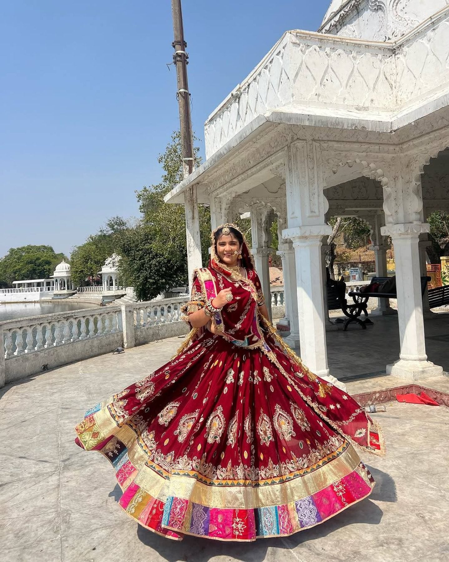 Red Digital Print Lehenga with Mirror Work and Gota Patti Detailing front view
