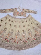 Cream Rangoli Silk Lehenga with Heavy Sequins Embroidery and Dupatta front view