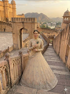 Cream Rangoli Silk Lehenga with Heavy Sequins Embroidery and Dupatta fabric texture detail