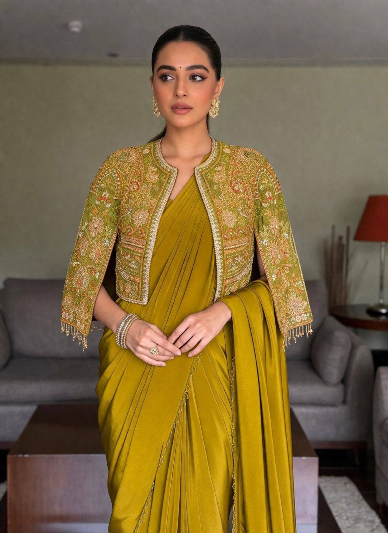 Lycra Drape Saree with Embroidered Silk Jacket Lehenga fabric texture detail