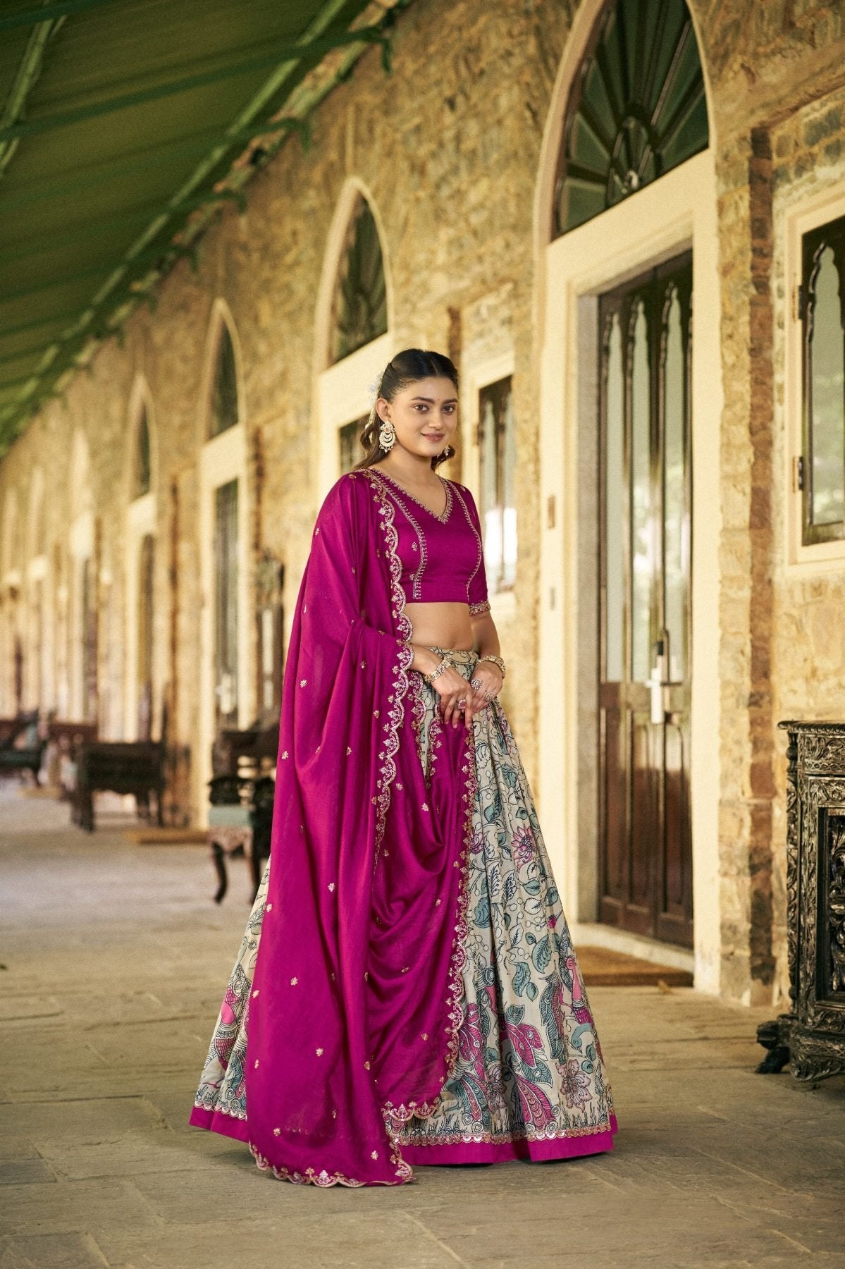 Pink Kalamkari Print Lehenga with Lace Border for Wedding Functions embroidery close-up