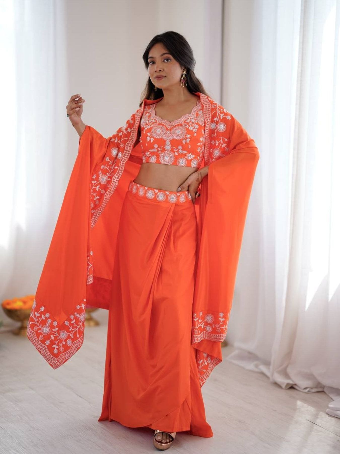 Indo Western Crepe Silk Dhoti Set with Silk Blouse Sequined Shrug Lehenga fabric texture detail