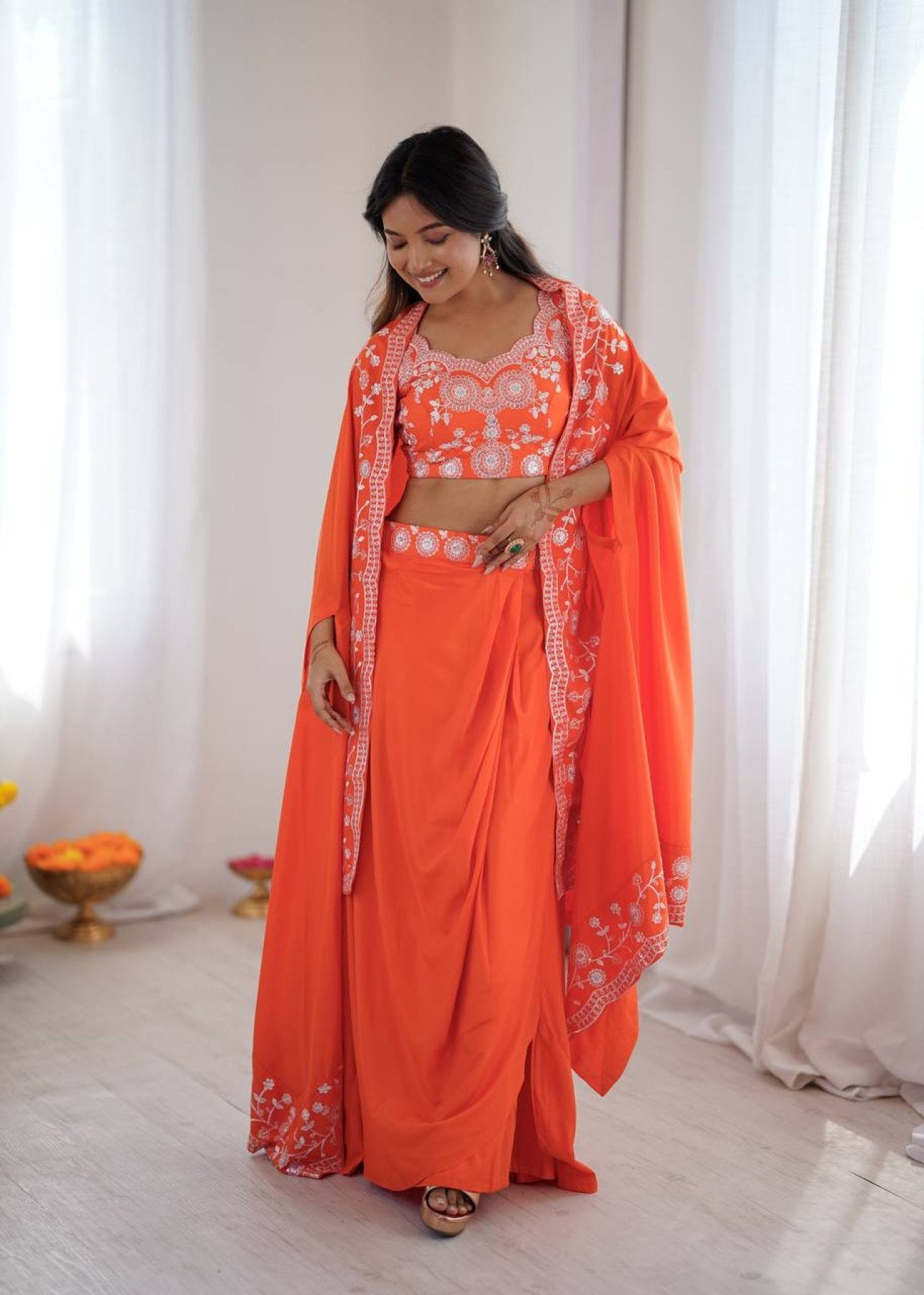 Indo Western Crepe Silk Dhoti Set with Silk Blouse Sequined Shrug Lehenga fabric texture detail