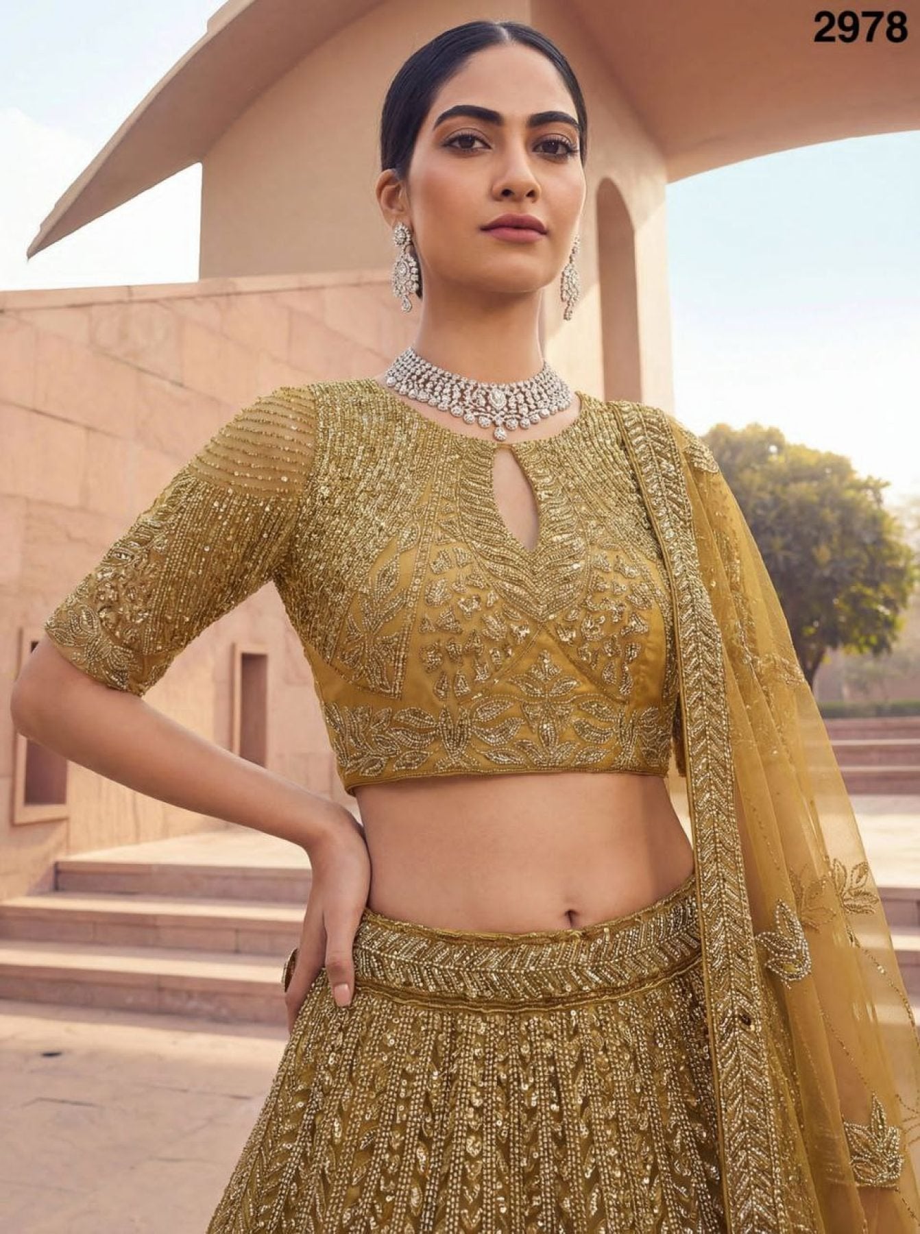 Golden Net Bridal Lehenga with Crystal and Sequins Work for Wedding Wear embroidery close-up
