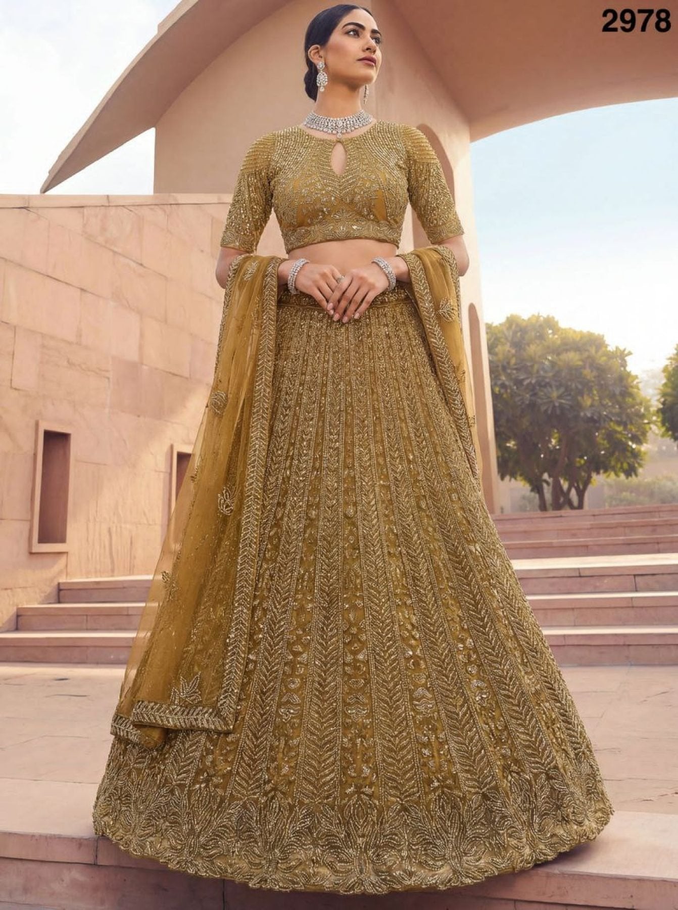 Golden Net Bridal Lehenga with Crystal and Sequins Work for Wedding Wear front view