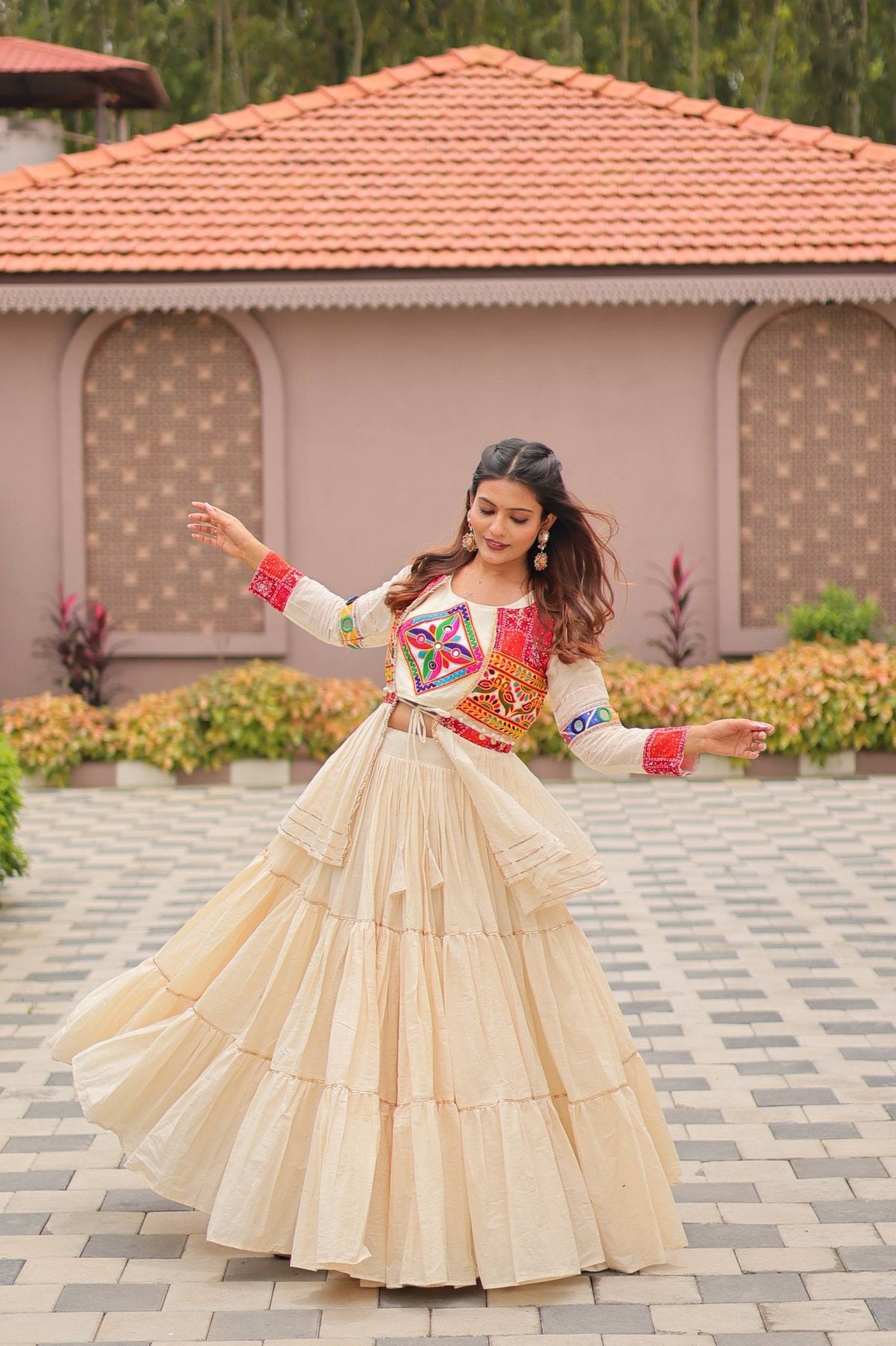 White GarbaGlow Cotton Lehenga with Flare and Gamthi Work for Navratri Nights styling view