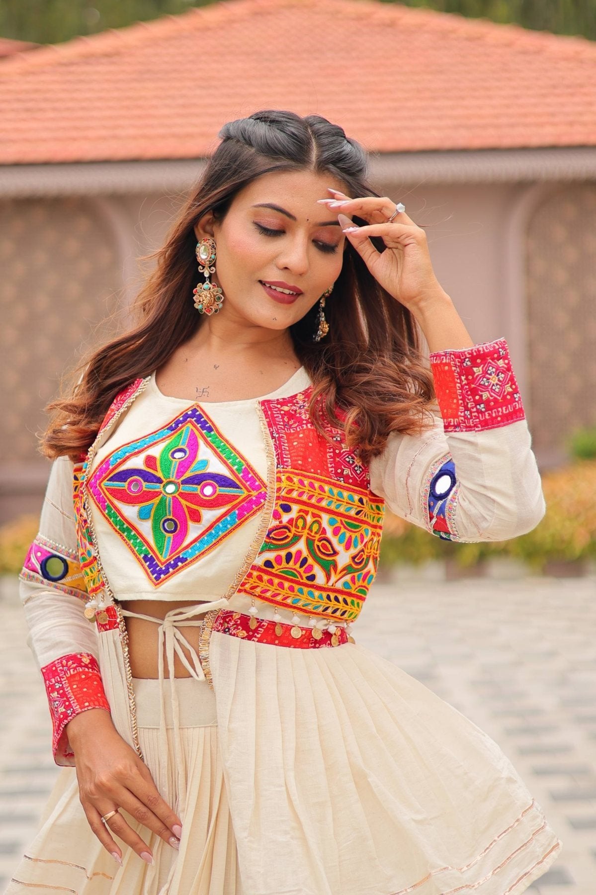 White GarbaGlow Cotton Lehenga with Flare and Gamthi Work for Navratri Nights embroidery close-up