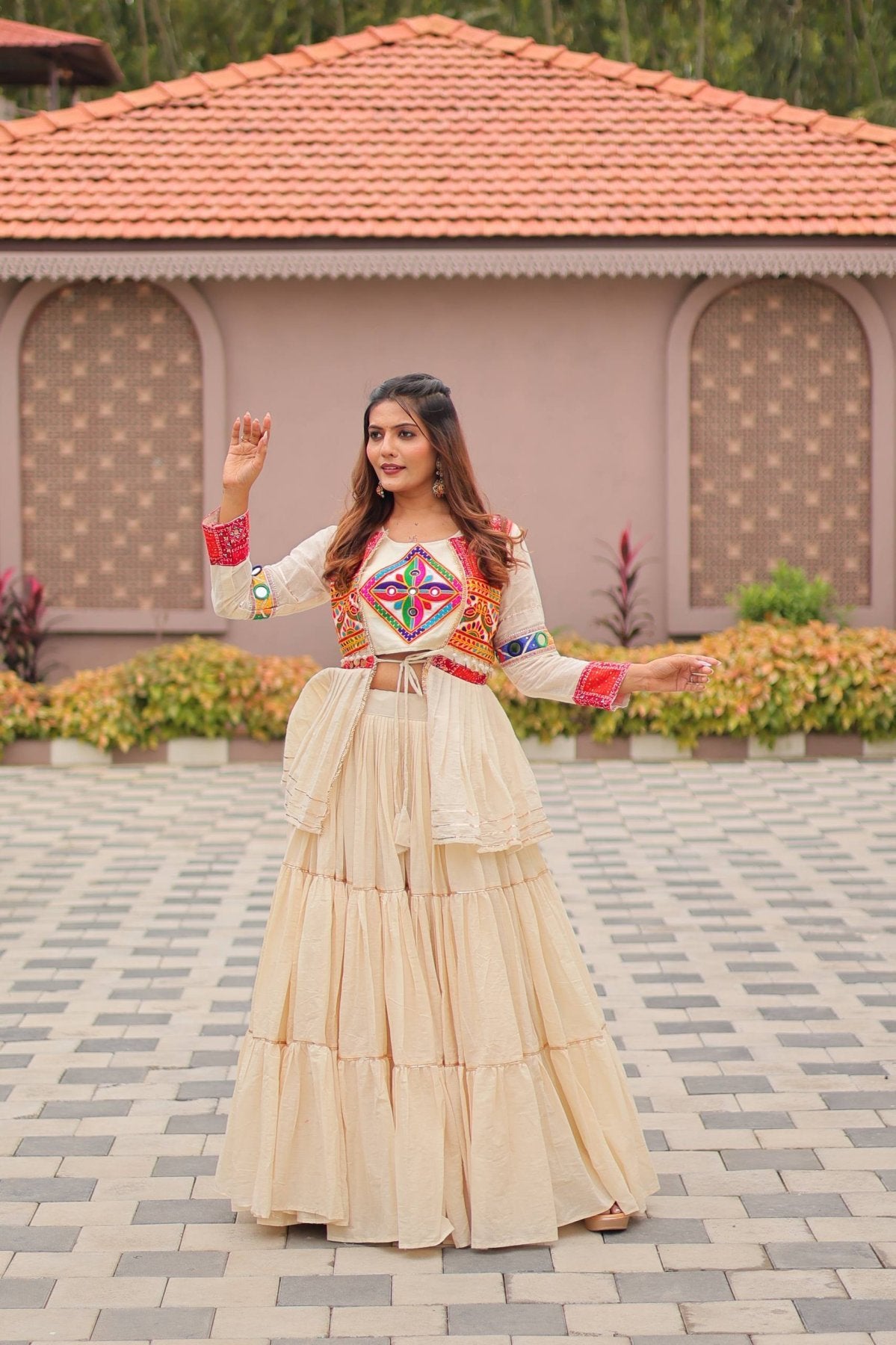 White GarbaGlow Cotton Lehenga with Flare and Gamthi Work for Navratri Nights styling view
