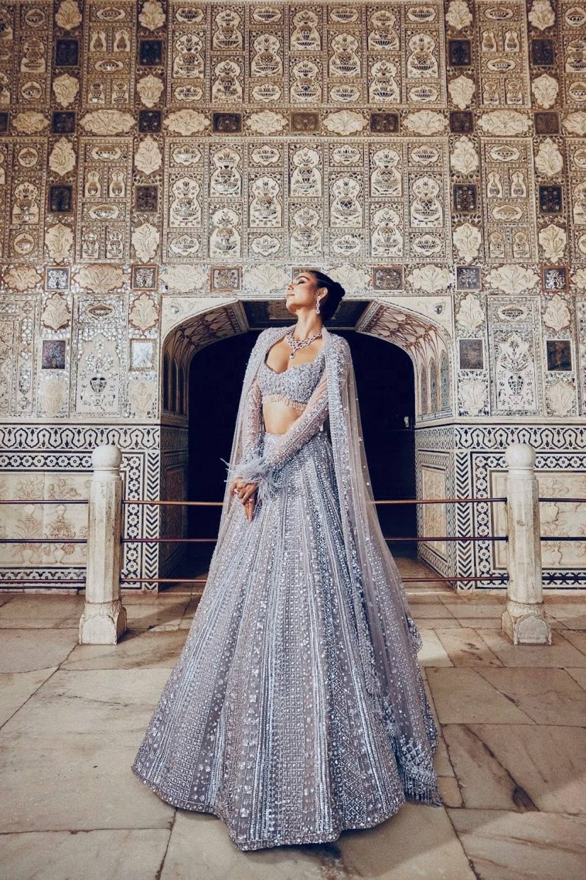 Grey Wedding Wear Lehenga with Heavy Embroidery and Tassel Dupatta styling view