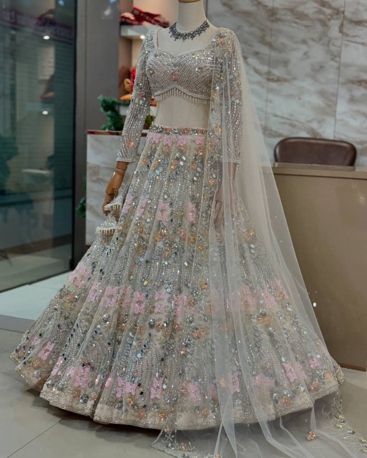 White Mirror Embroidered Lehenga Set with 4 Meter Flair fabric texture detail