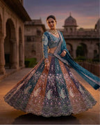 Soft Butterfly Net Lehenga Choli with Heavy Sequins Embroidery fabric texture detail