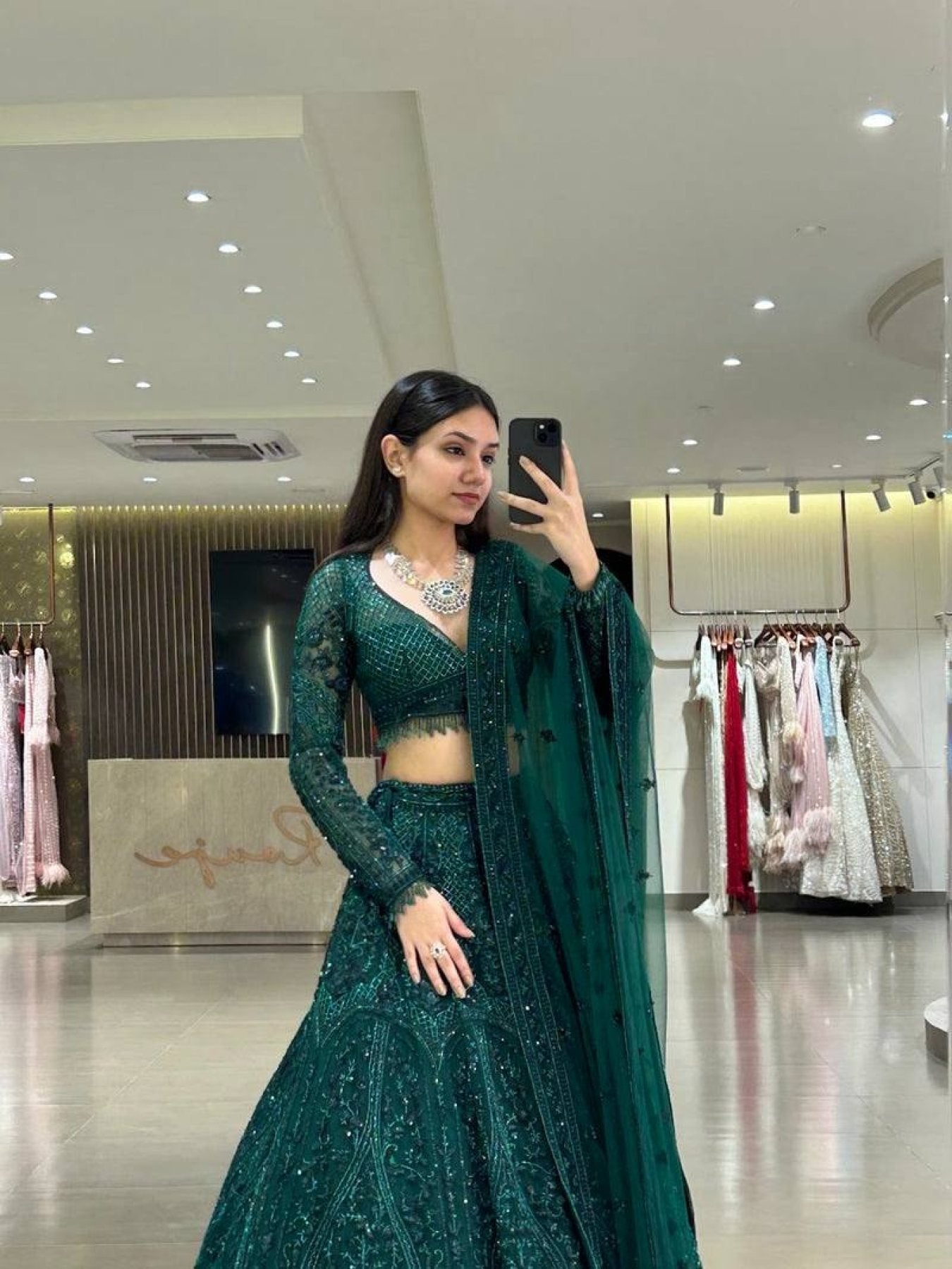 Green Legendary Net Lehenga Choli with Dori Sequins Work fabric texture detail