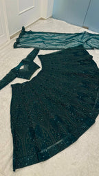 Green Legendary Net Lehenga Choli with Dori Sequins Work styling view